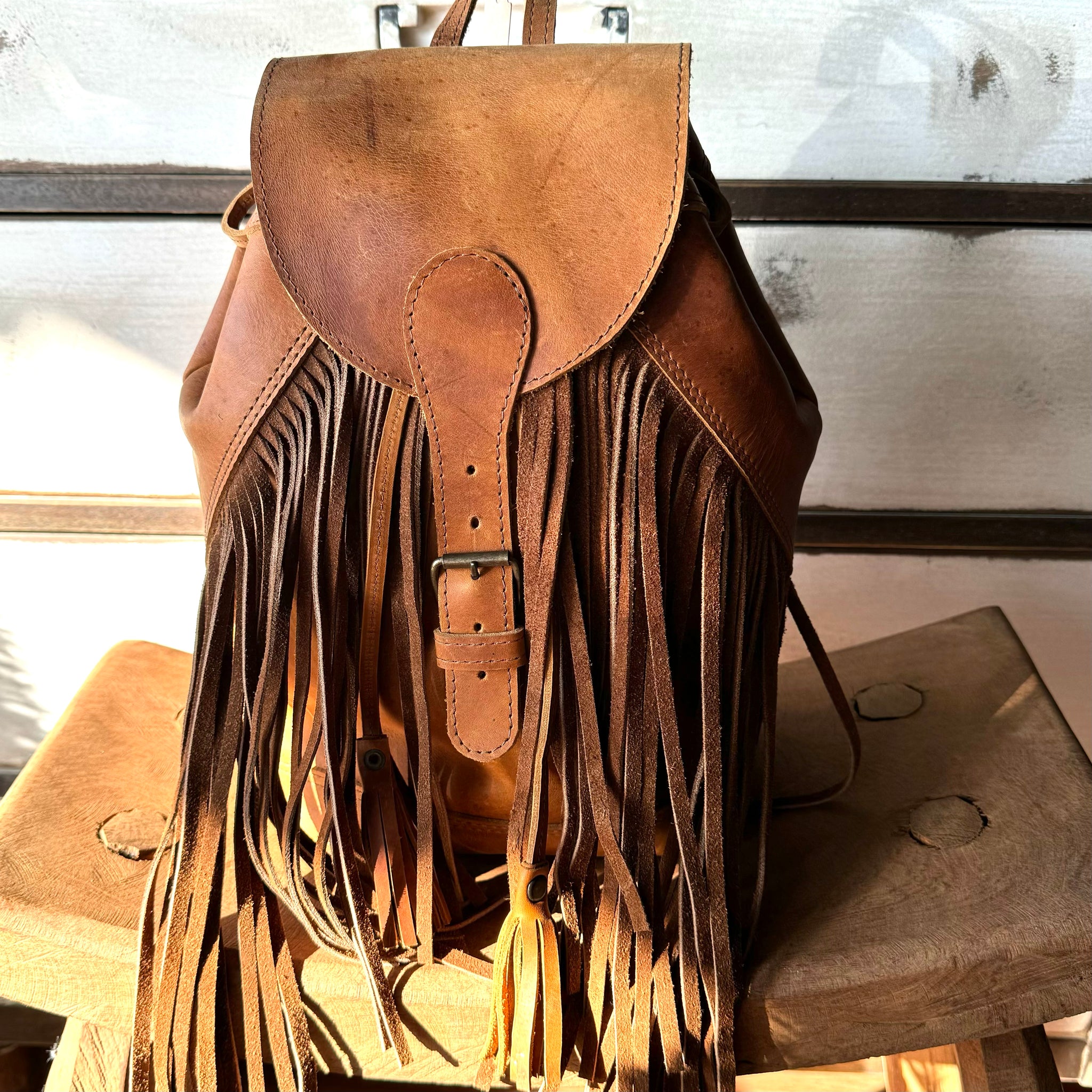 Fringe bucket backpack - tan